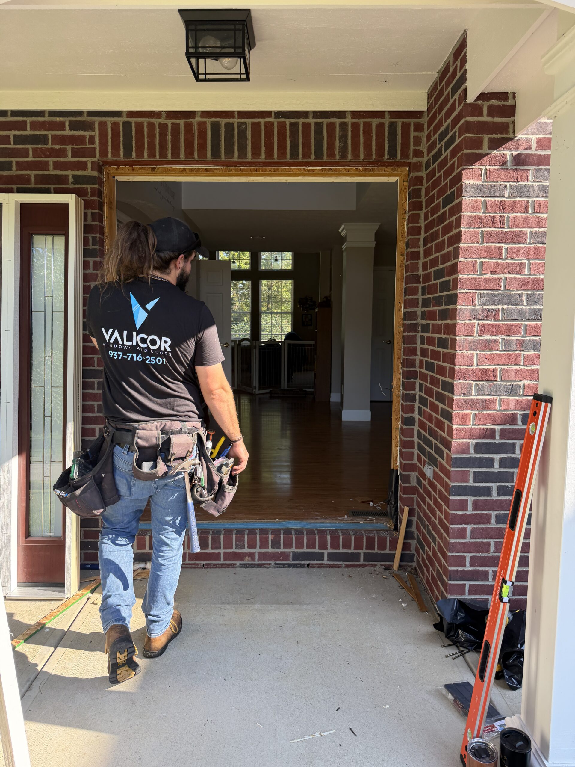 Entry door being installed during Springboro Ohio replacement project