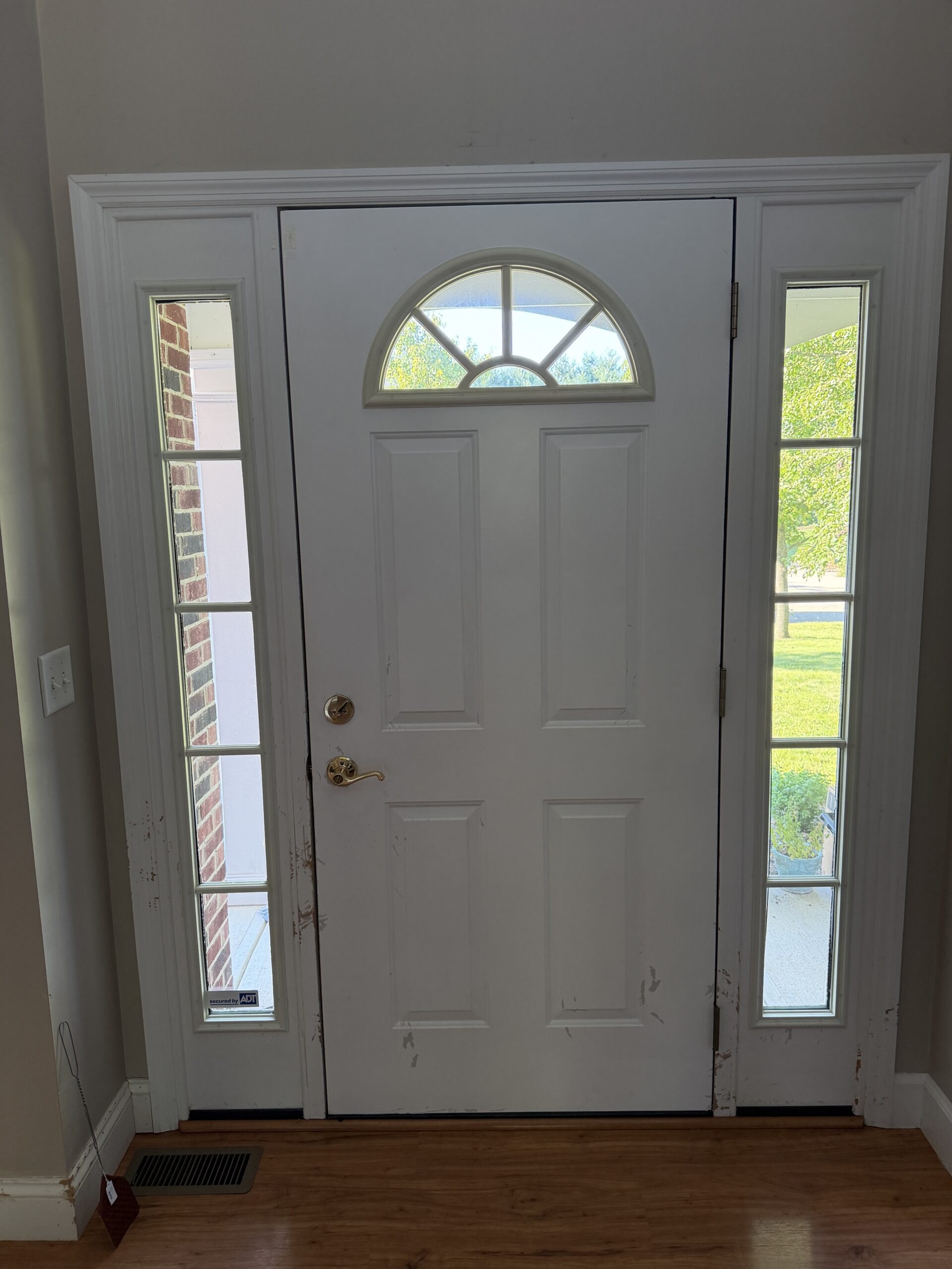 Interior before entry door replacement in Springboro Ohio