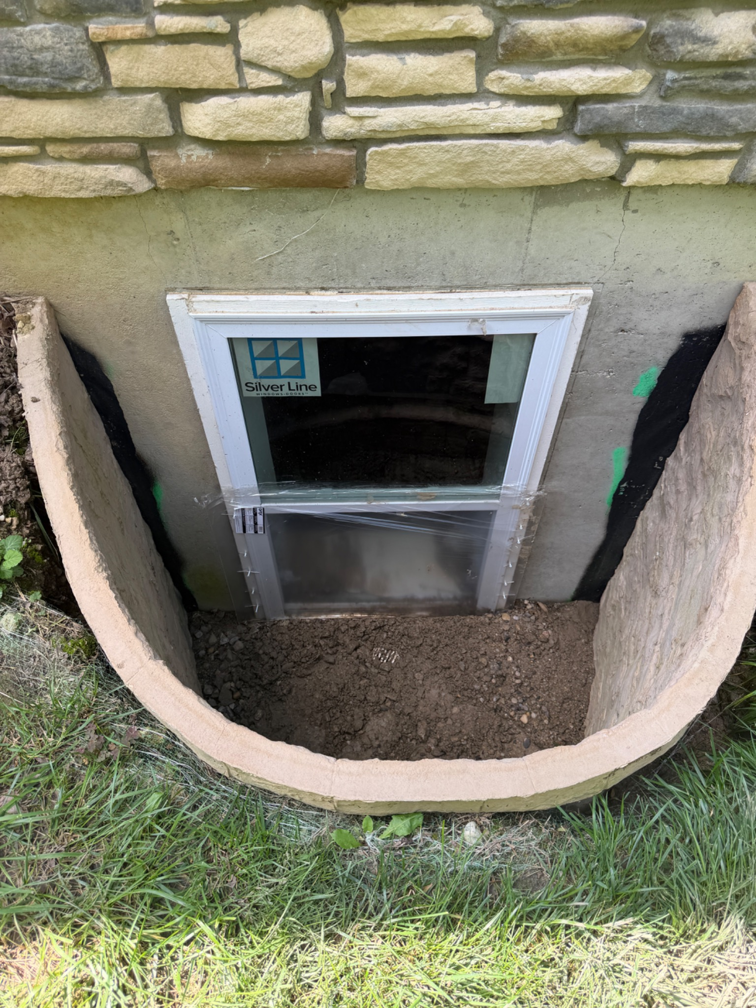 Original double hung basement window before egress replacement in Centerville Ohio
